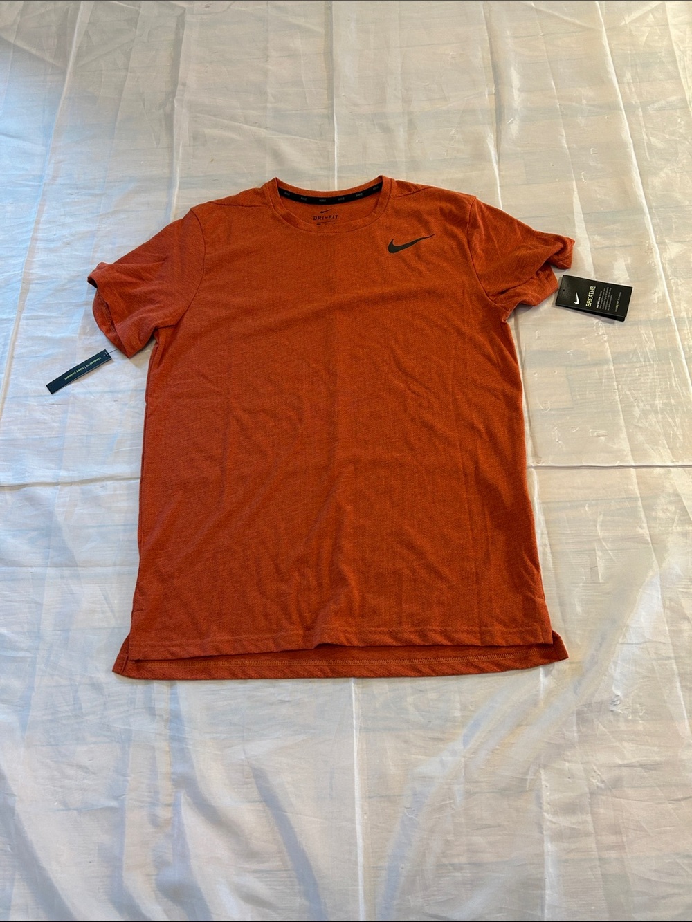 Nike Men’s Short-Sleeve Crew Tee in Burnt Orange with Black Swoosh
